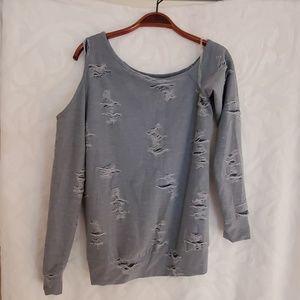 Gray ripped elegant top.
